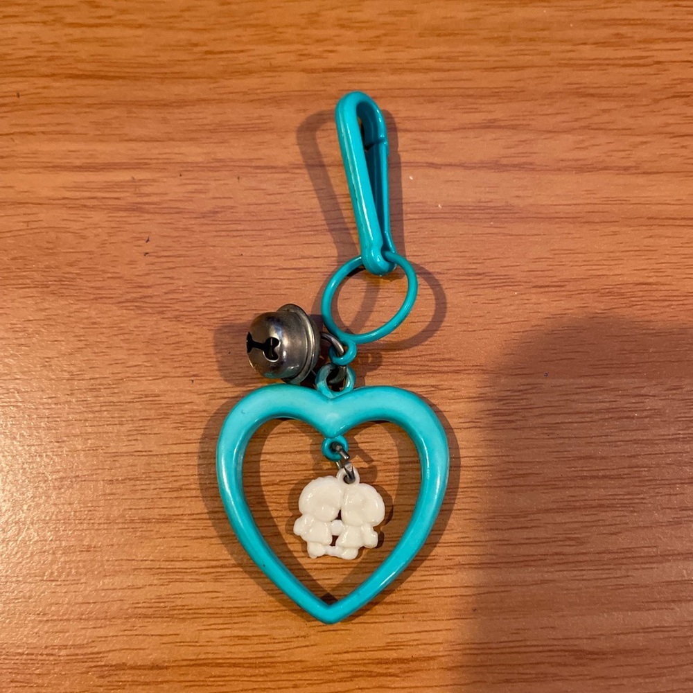 Vintage 1980s Plastic Bell Charm Turquoise Heart Shaped With Couple in Center